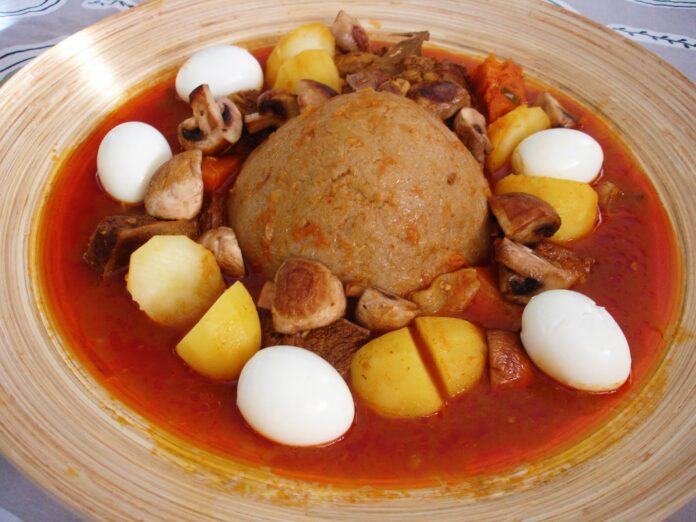 Bazin (Libyan Hard Dough with Lamb Sauce)