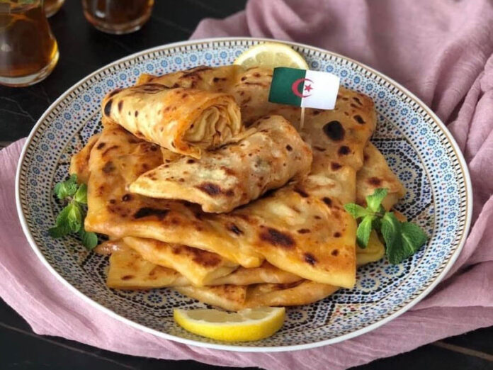 Mhajeb1-fotor-20260823141312 (1) Mhadjeb (Algerian Stuffed Semolina Flatbread)
